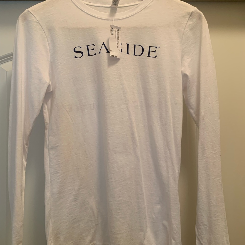 White Long Sleeve Shirt with SEASIDE Logo. Seaside,Florida